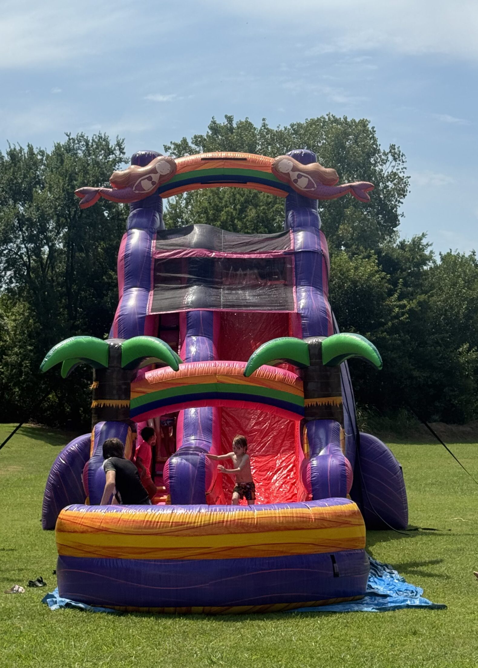 Rainbow Reef 22ft Water slide scaled e1774216690723 Home